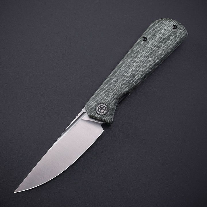 Petrified Fish Viking Green micarta
