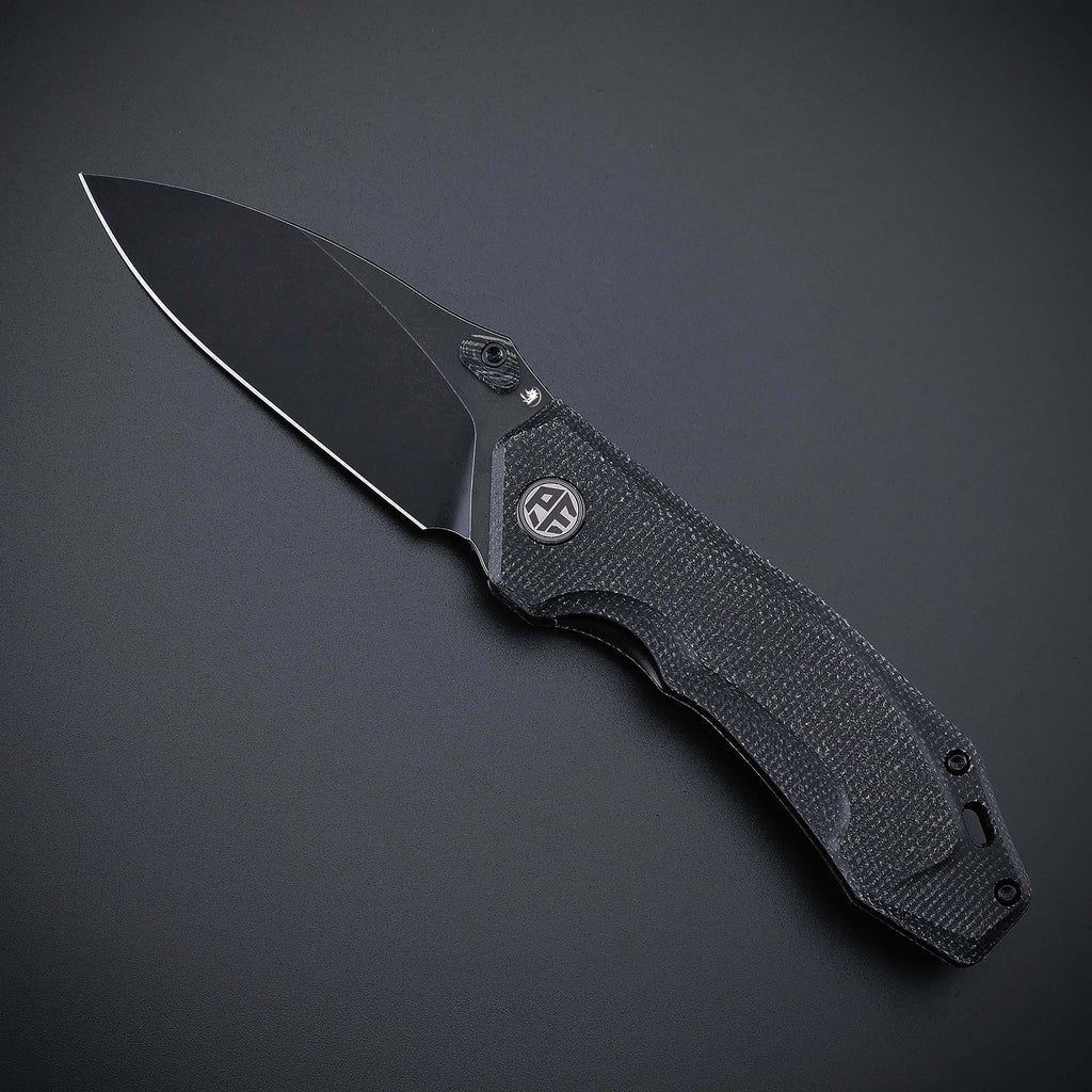 Petrified Fish Havrog Black micarta