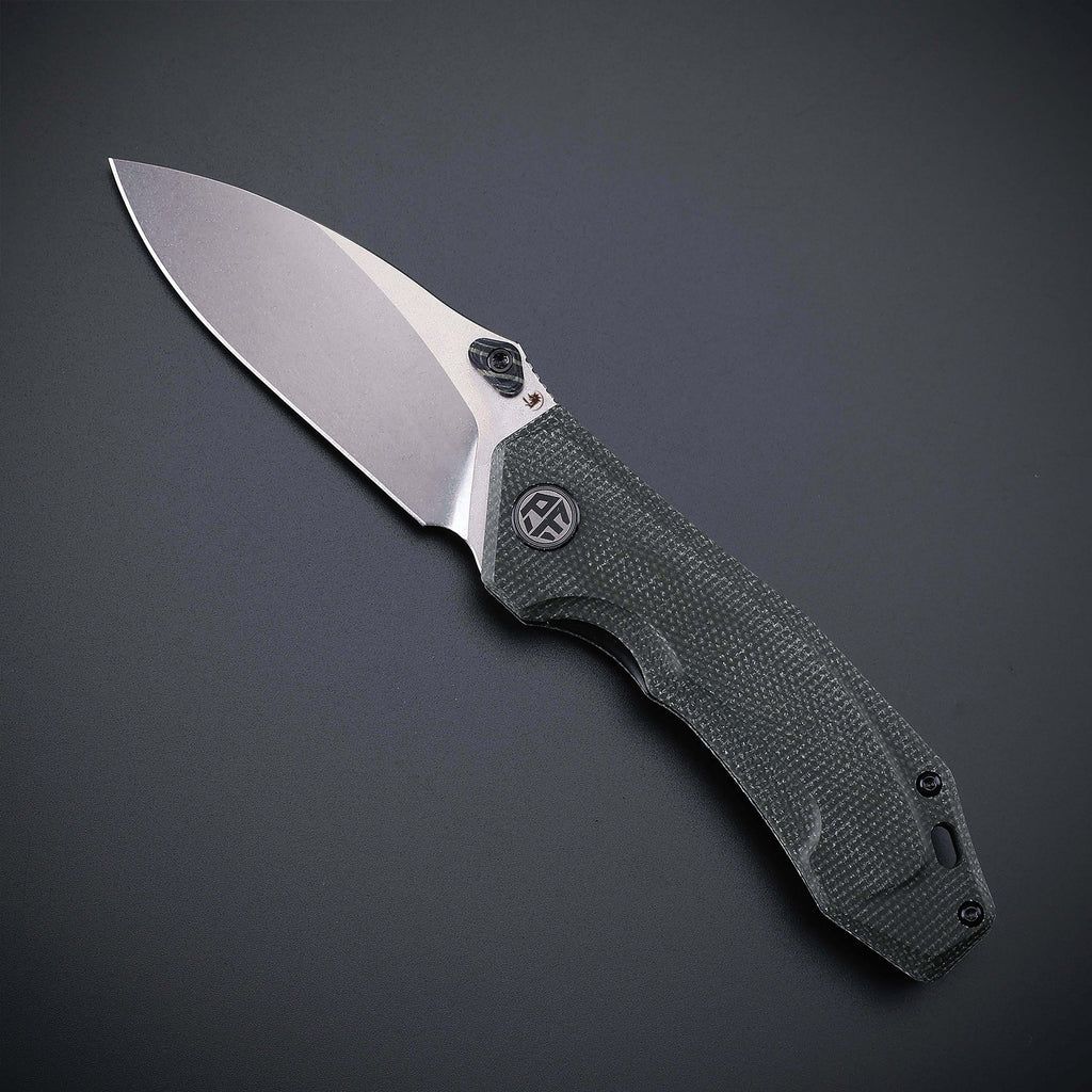 Petrified Fish Havrog Green micarta