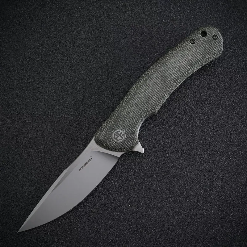 Petrified fish Warrior Green micarta K110