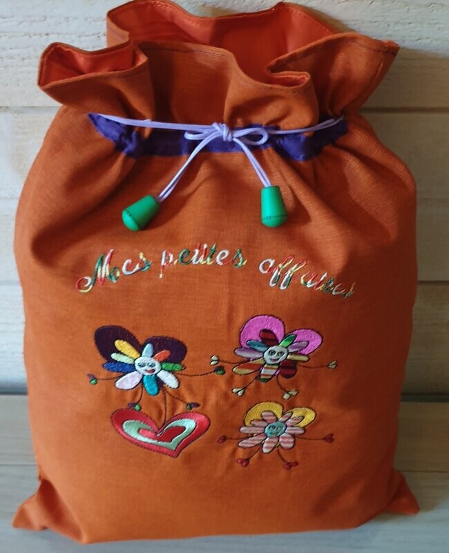 POCHON/SAC A LINGE 
FLEURS RIGOLOTES