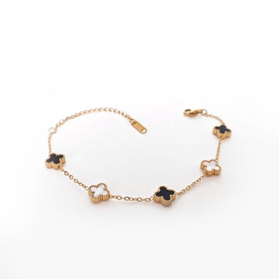 Black &amp; White Clover Bracelet – Gold-Toned Balance with Bold Elegance