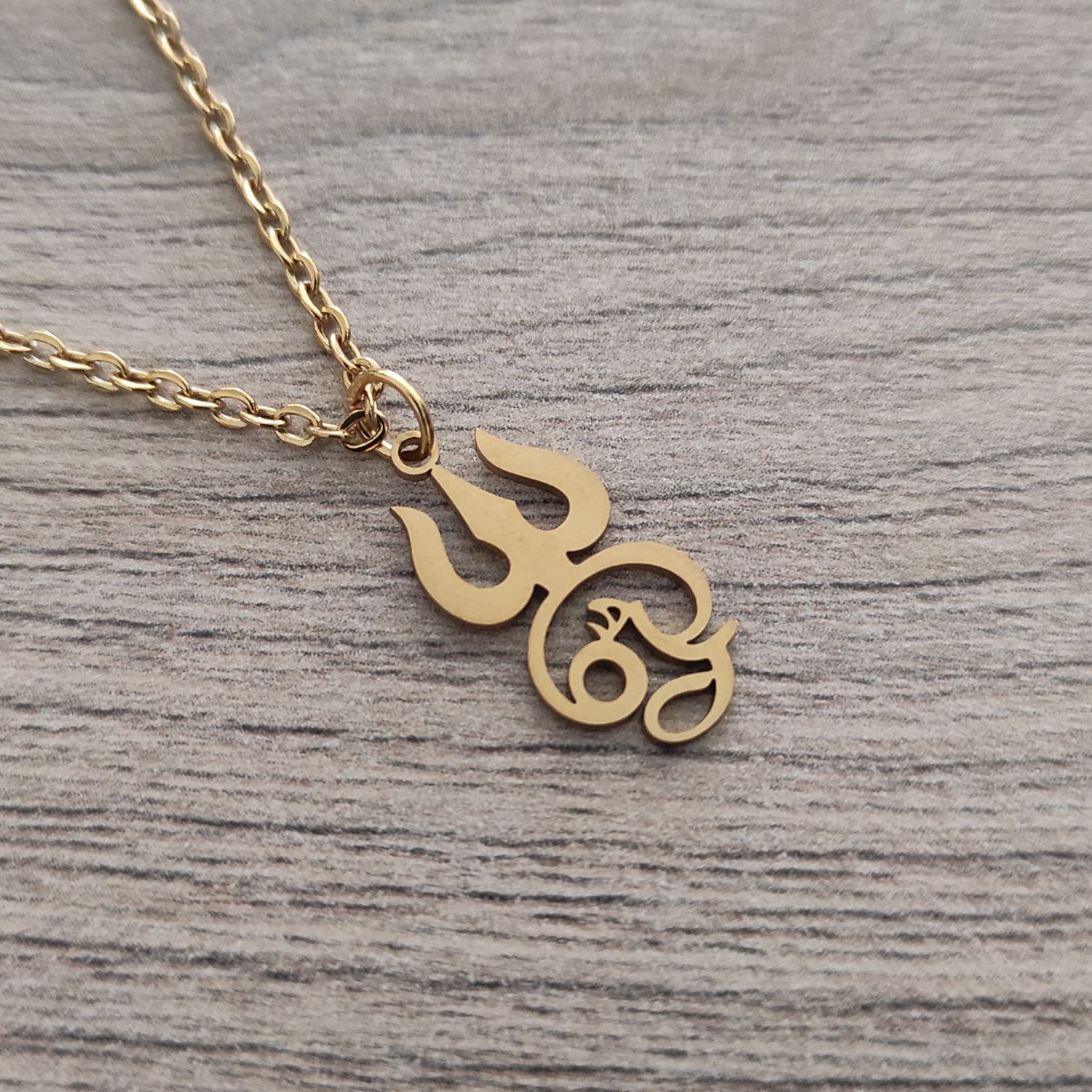 Aum (Om) and Trishul necklace (Gold toned)