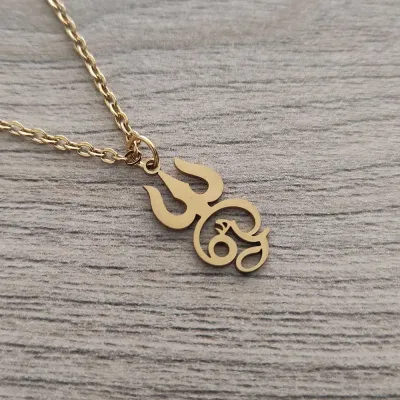 Aum (Om) and Trishul necklace (Gold toned) Aum (Om) and Trishul necklace (Gold toned)