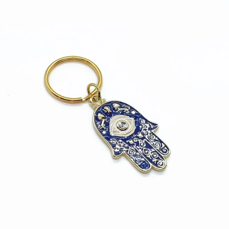 Gold toned Hamsa hand and evil eye key chain