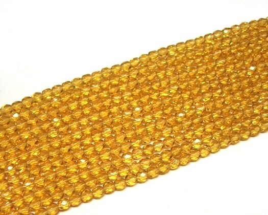 Mezzi Cristalli ovali 4 mm Topazio medio