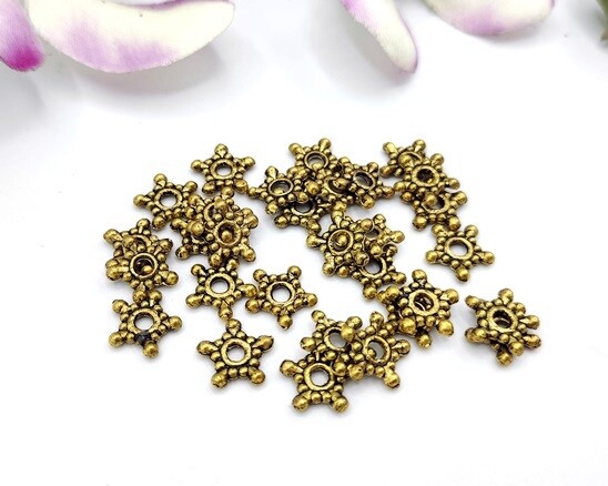 Separatore stella oro antico 30 pz