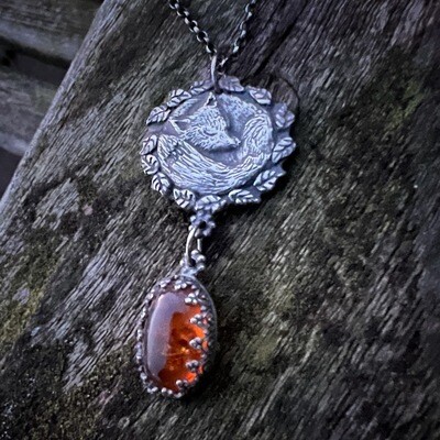 Sleeping fox pendant in silver with set amber.
