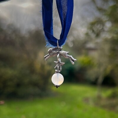 Leaping Hare ribbon pendant with star and moonstone.