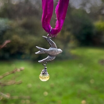 Swallow bird ribbon pendant with lemon quartz.