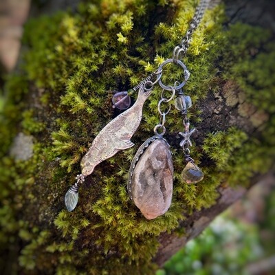 Selkie Seal totem pendant with silver seal and silver starfish, silver set sparkling fossil seashell, lemon quartz, carved aquamarine leaf, quartz, amethyst and peridot