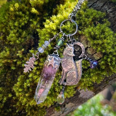 Fox totem pendant with set amethyst point, silver oak leaf with lilac jade and green garnet, silver moon with amethyst and a phrenite briolette dangle beneath the fox.