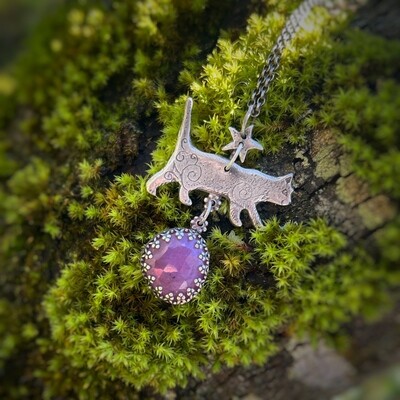 Cat pendant with star and set pink sapphire