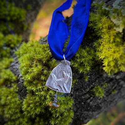 Fox ribbon pendant with natural citrine briolette.
