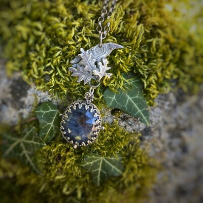 Medium Crow in Tree pendant with set Sapphire.