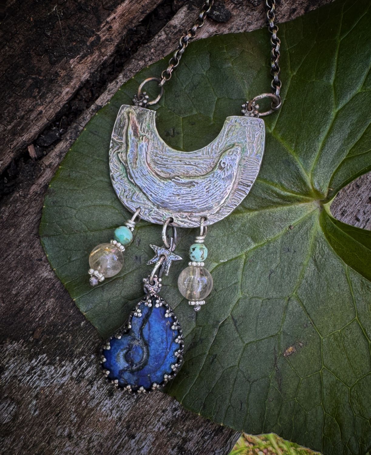 Swimming Otter pendant