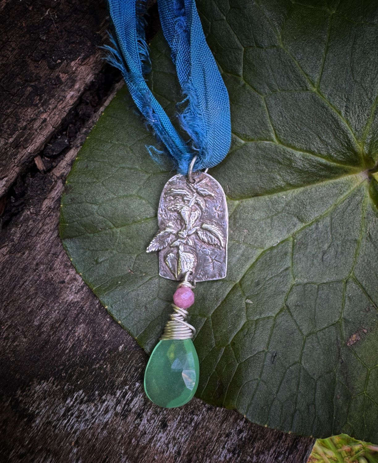 Nettle herbalist pendant on recycled sari silk ribbon
