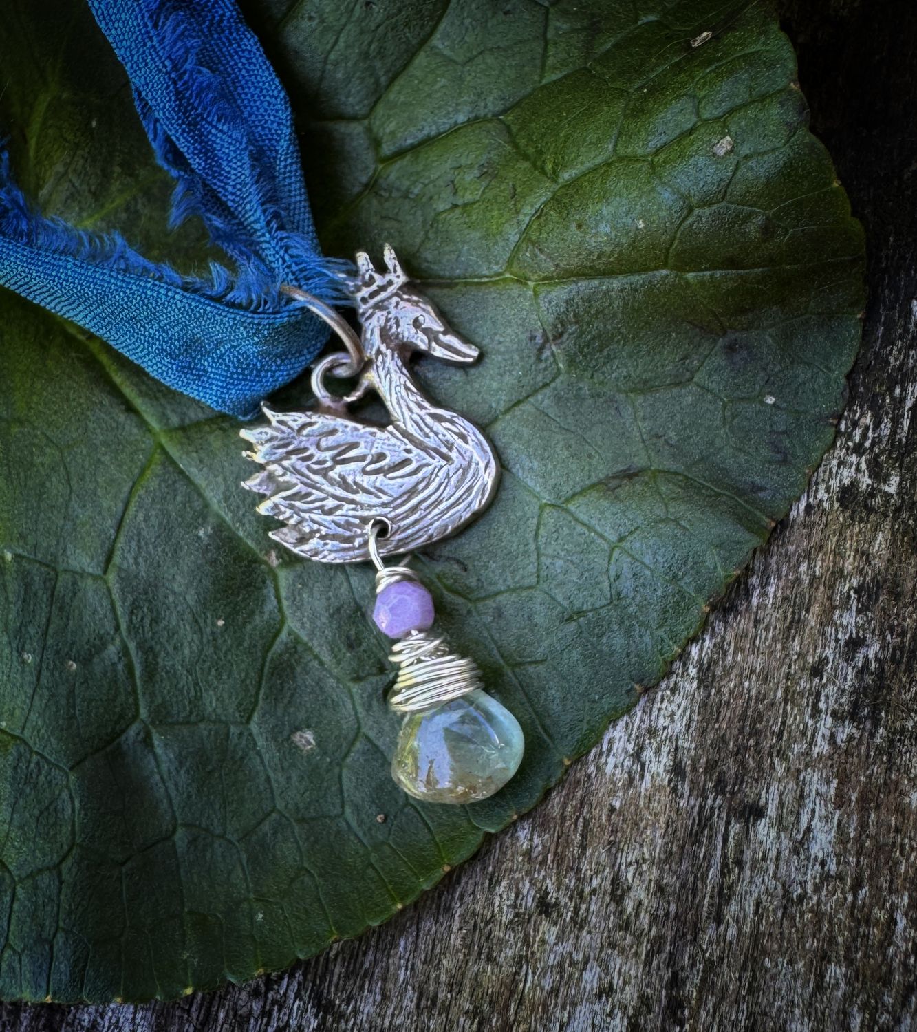 Swan pendant on recycled sari silk ribbon