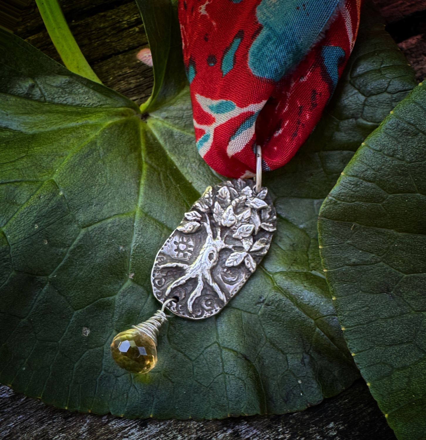 Tree pendant on recycled sari silk ribbon