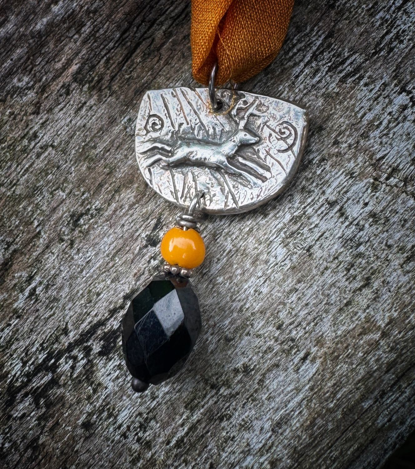 Running Stag pendant on recycled sari silk ribbon