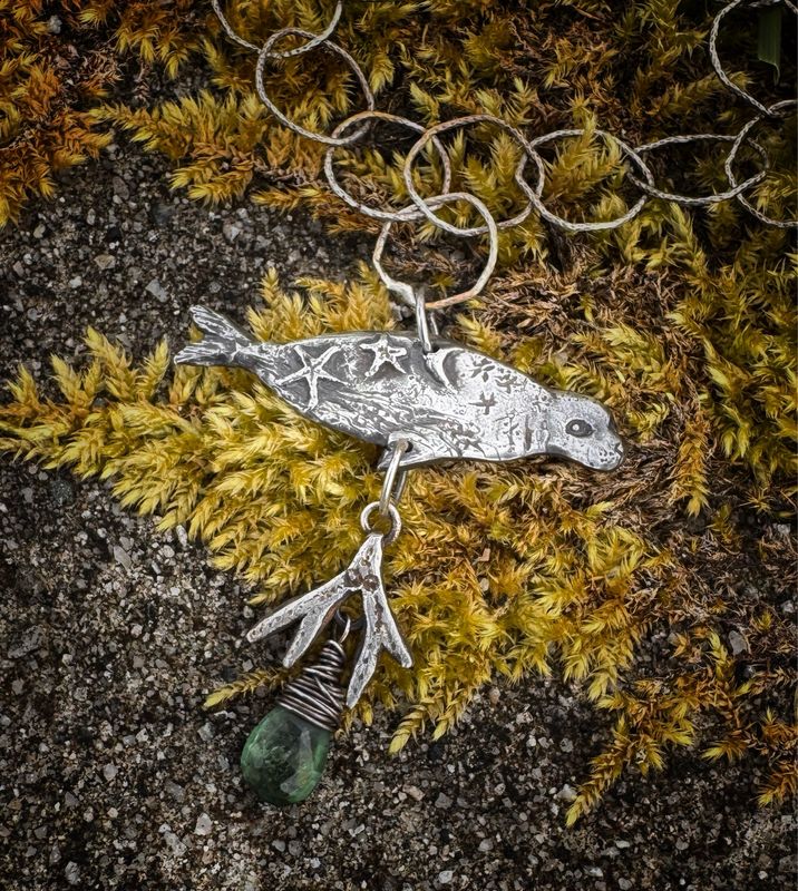 Mid Size Seal Pendant on Silver Chain