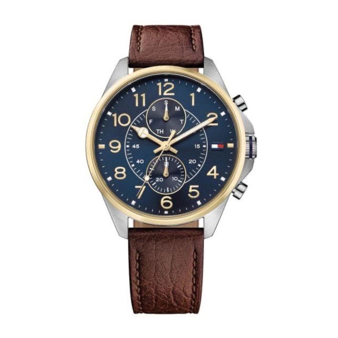 ommy Hilfiger Dean men&#39;s watch with a blue dial, three subdials, gold-tone hands and markers, and a brown leather strap.