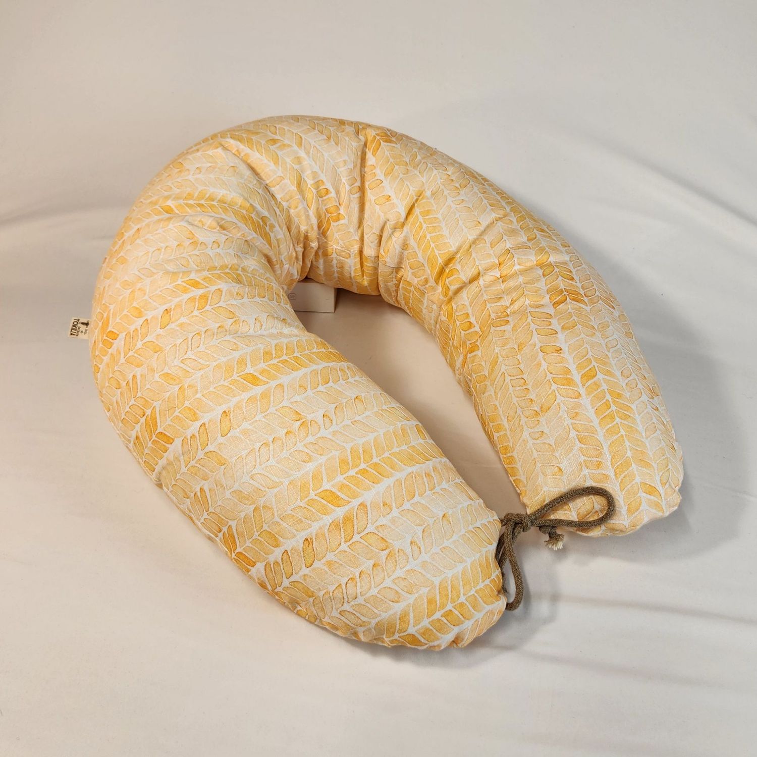 Coussin d'allaitement à feuilles oranges