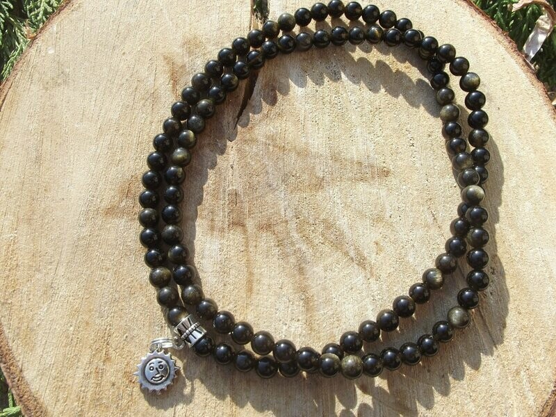 Mala obsidienne dorée