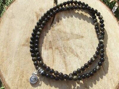 Mala obsidienne dorée