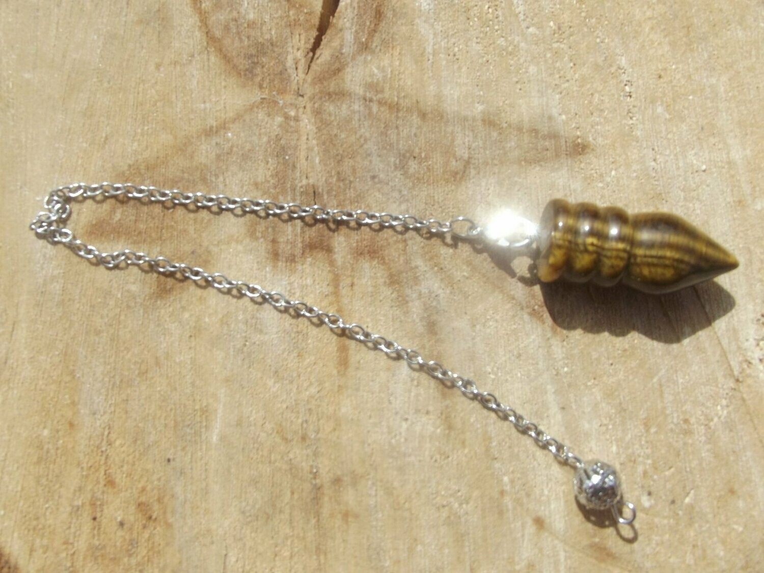 Pendule en oeil de tigre