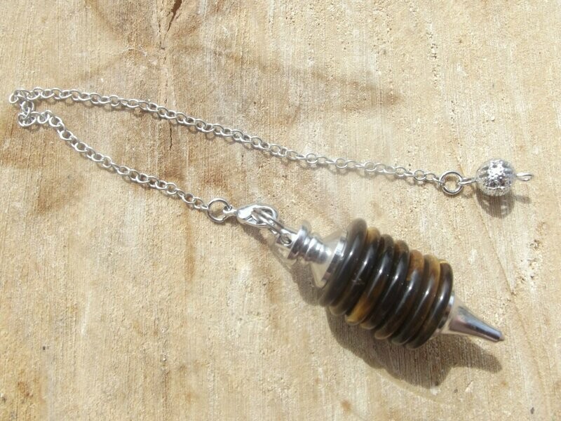 Large pendule en oeil de tigre