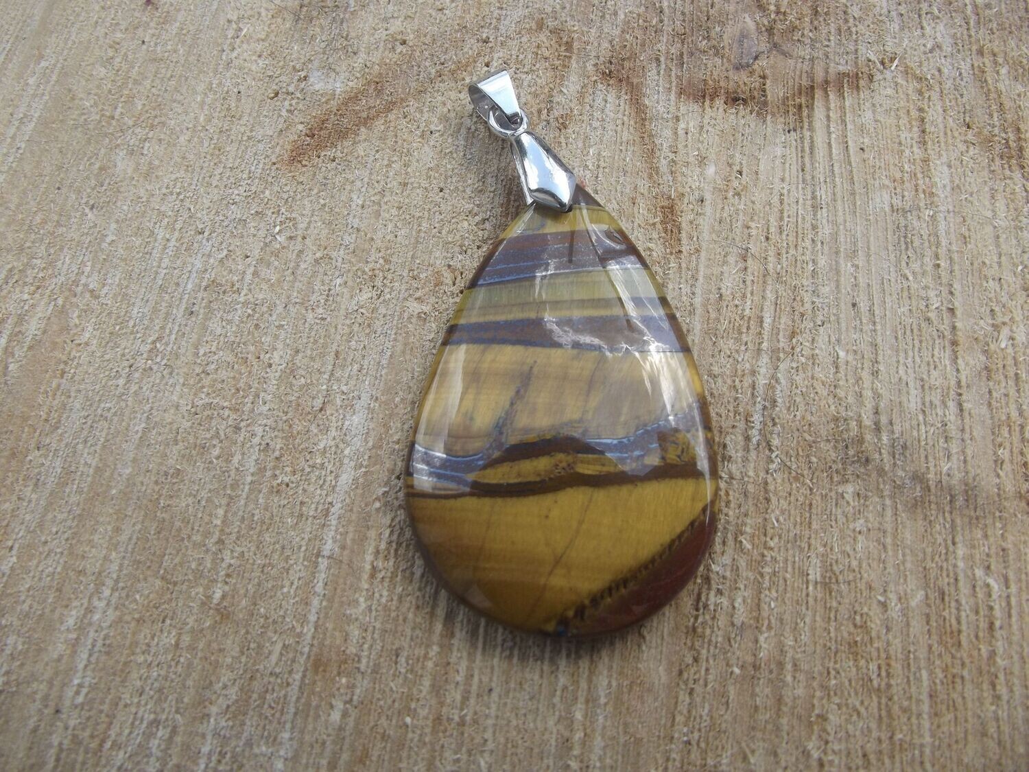 Pendentif oeil de fer