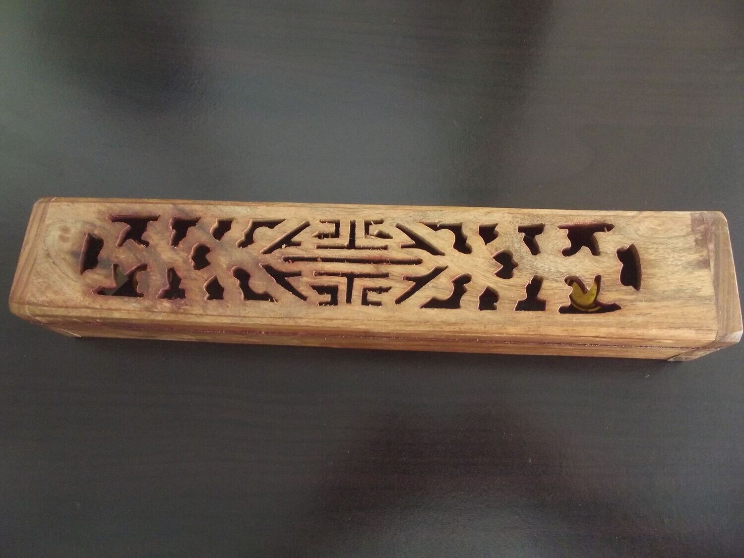 Porte encens ajouré en bois