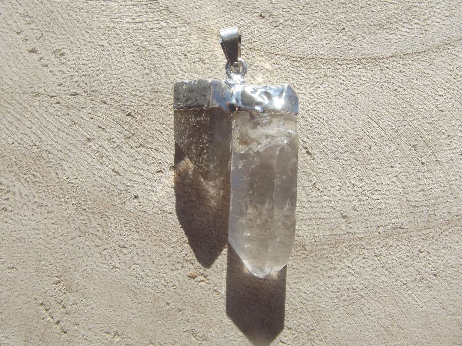 Pendentif double pointe cristal de roche