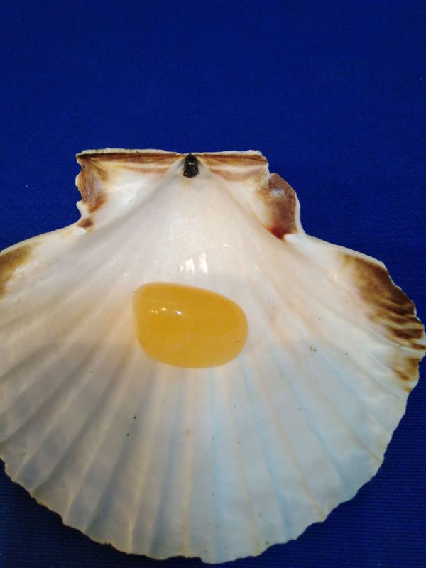 Calcite orange en pierre roulée
