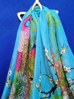 Echarpe turquoise avec paon