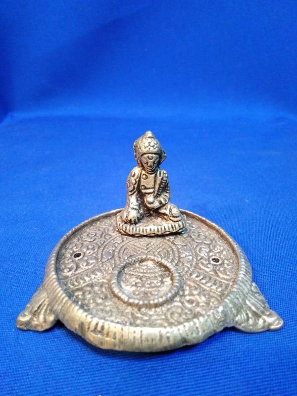 Porte encens rond en métal Bouddha