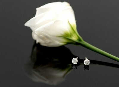 Boucles d'oreille or blanc & diamants 2x 0.18ct.
