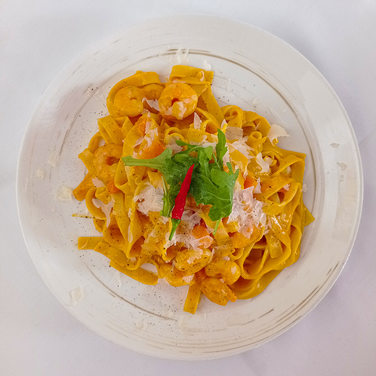 Tagliatelle mit Garnelen und Kürbis (Chili)
