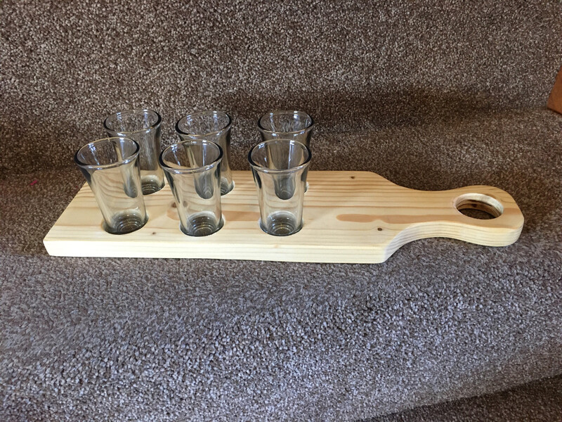 Shot glass paddle complete with 6 Shot Glasses.