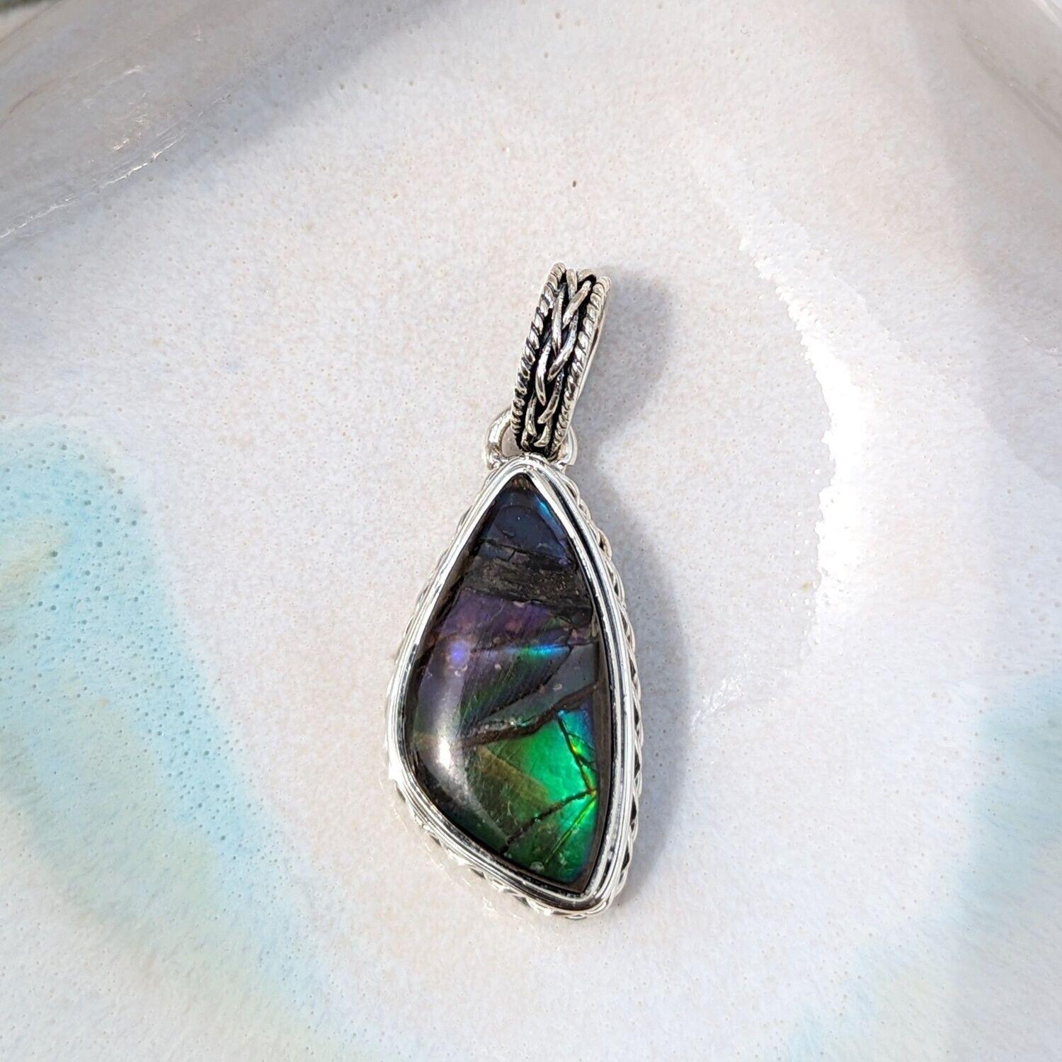 Sterling Silver Ammolite Pendant With Braided Details