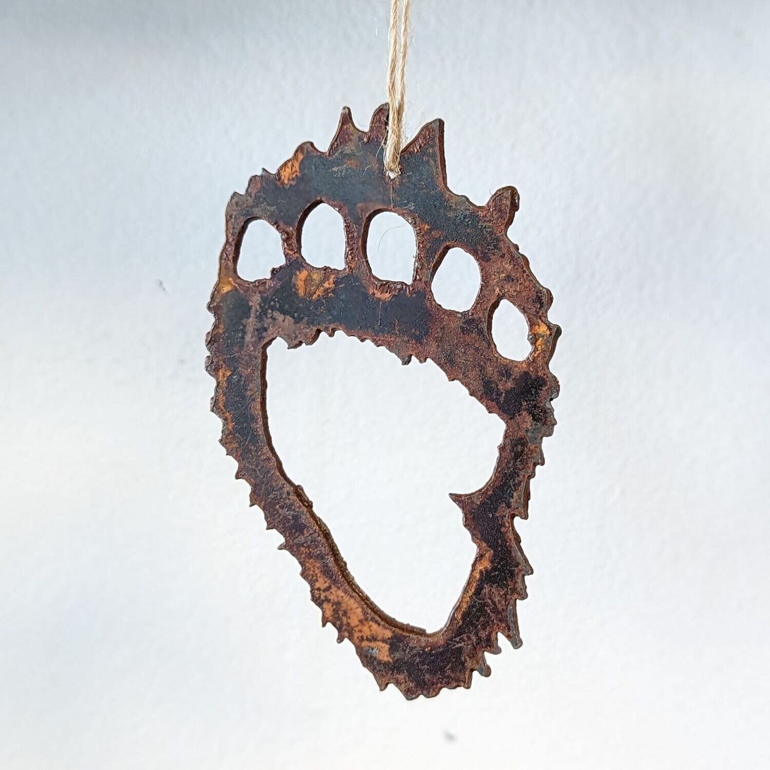 Rusted Bear Paw Ornament