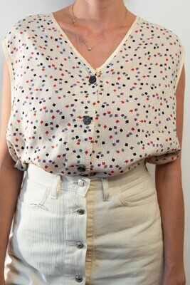 Beige sleeveless shirt with pattern