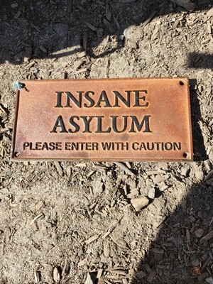 INSANE ASYLUM CAST IRON SIGN 
