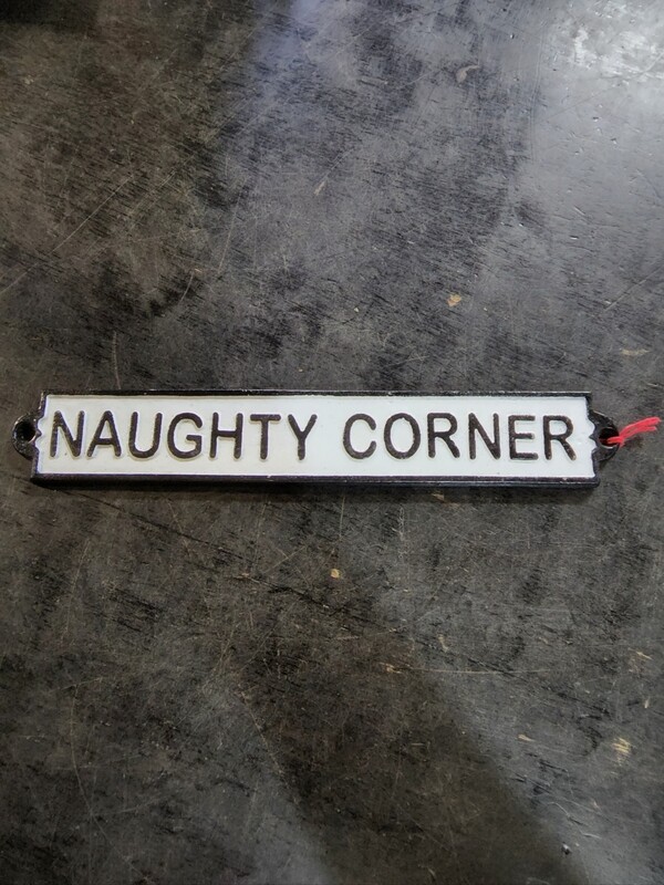 NAUGHTY CORNER CAST IRON SIGN