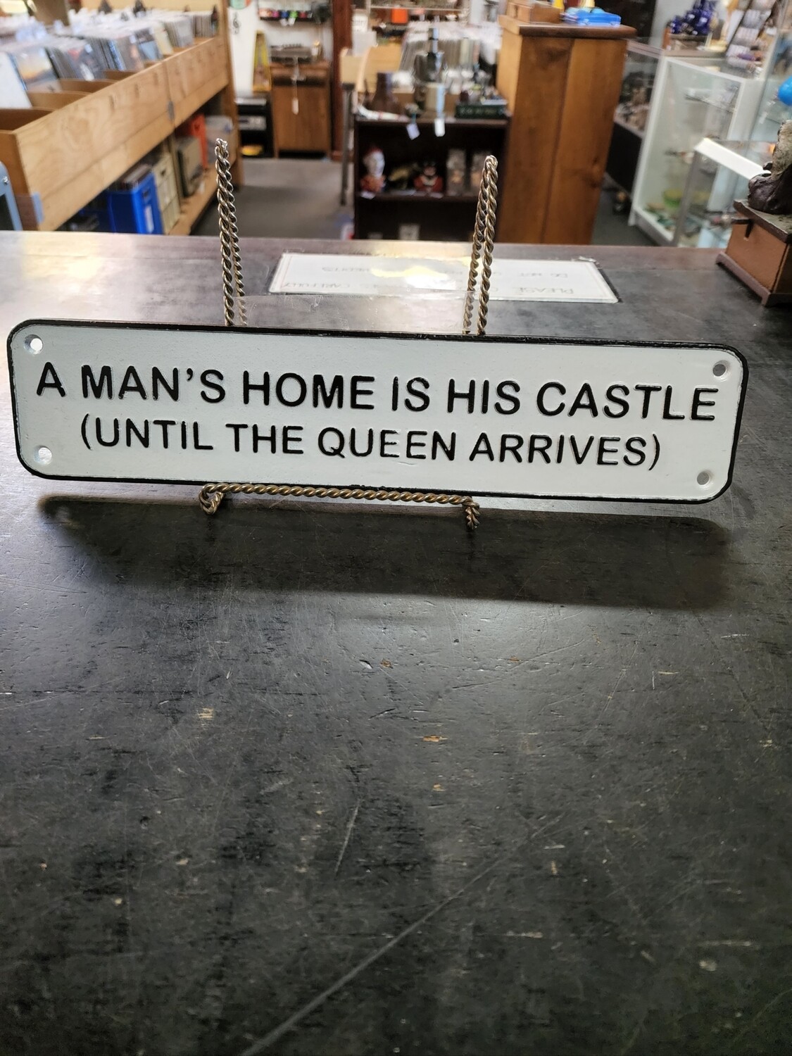A MAN'S HOME IS HIS CASTLE (UNTIL THE QUEEN ARRIVES) CAST IRON SIGN