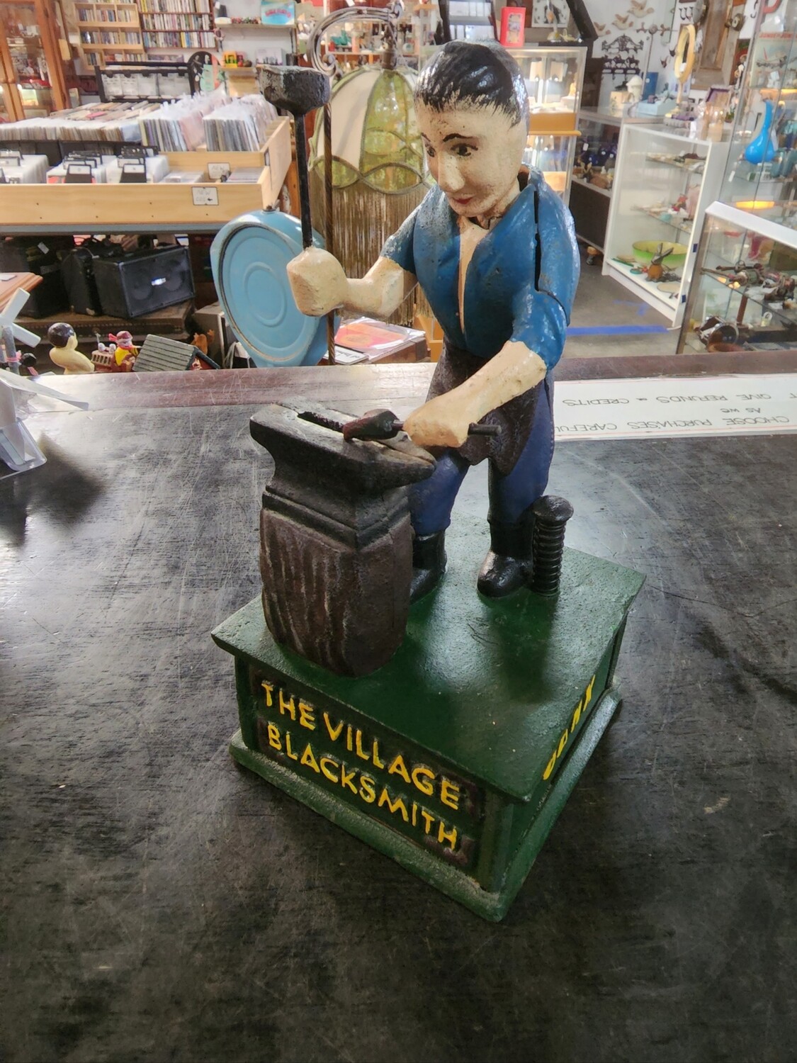 THE VILLAGE BLACKSMITH CAST IRON MECHANICAL MONEY BANK