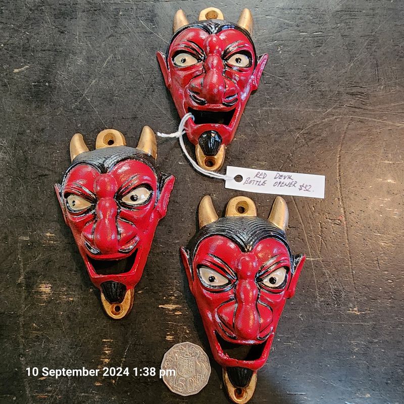 RED DEVIL CAST IRON BOTTLE OPENER