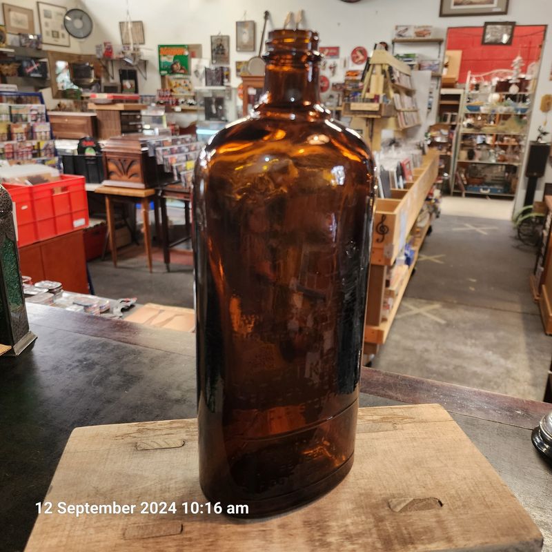LAUREL PEGASUS KEROSENE AMBER GLASS BOTTLE