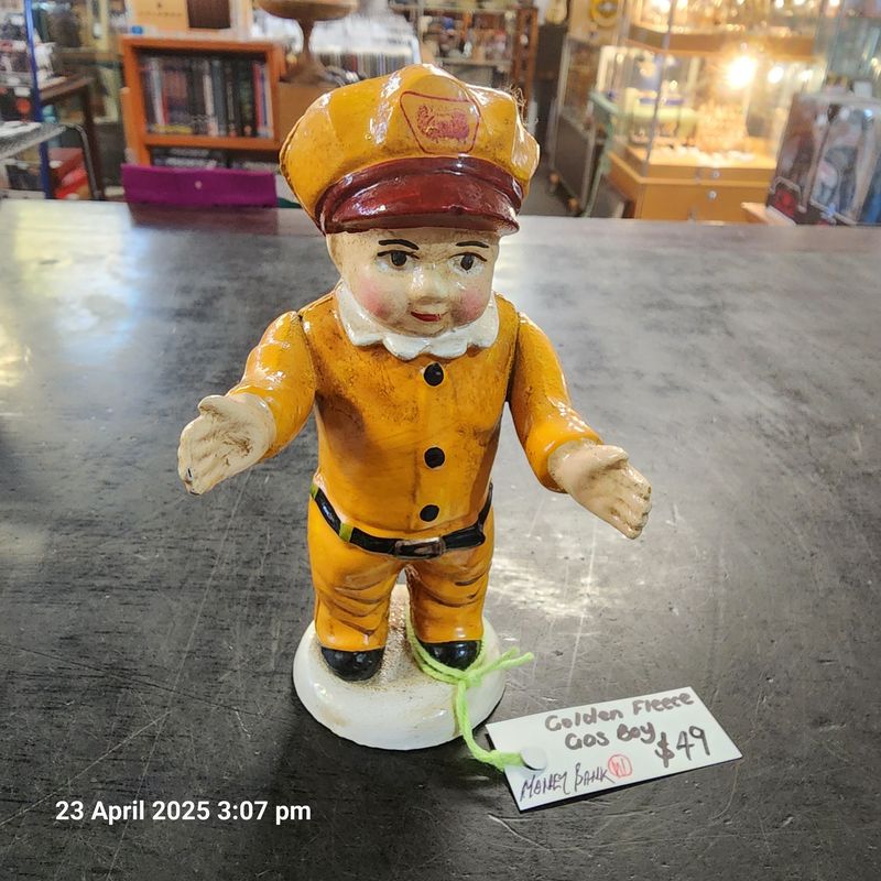 GOLDEN FLEECE GAS BOY CAST IRON MONEY BANK